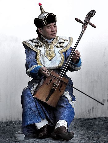 Musician playing the traditional Mongolian mus...